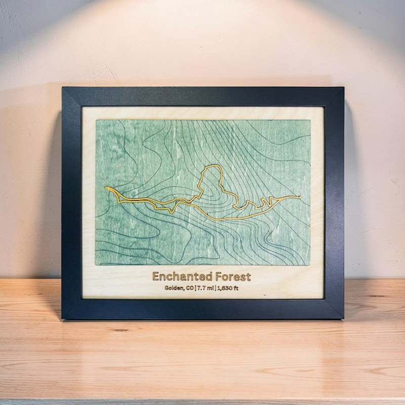 Laser-cut wooden mountain bike trail map